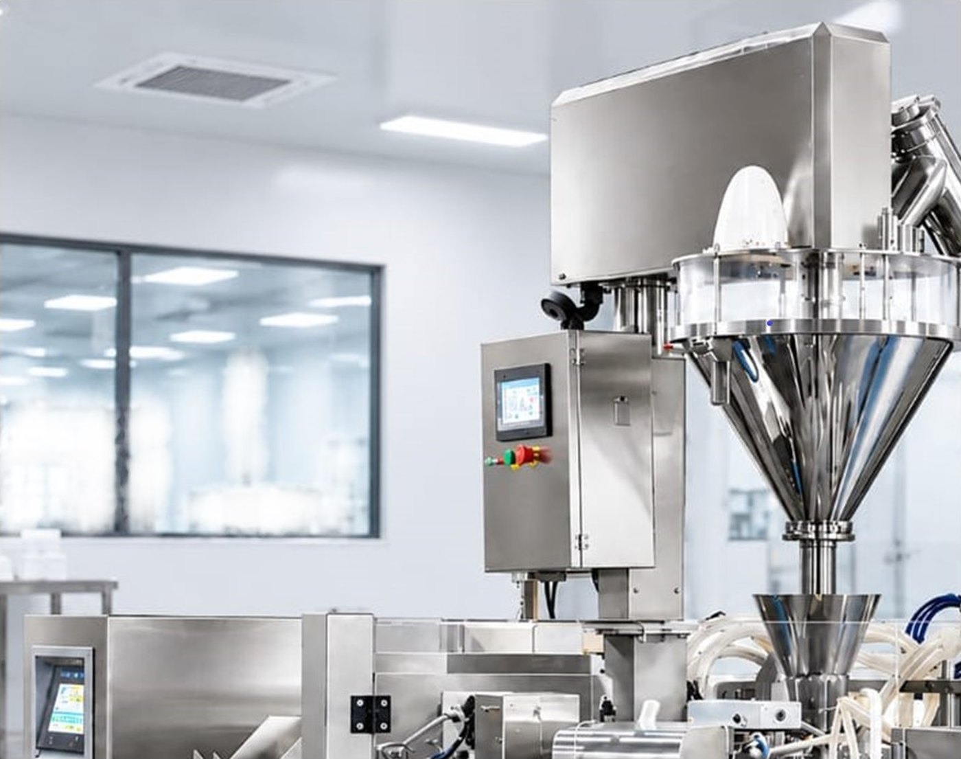 An auger powder filling and pouch packing machine of the kind used to pack premix